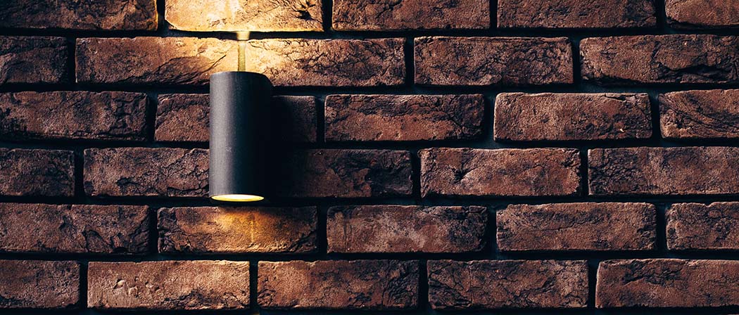 modern lamp on brick wall