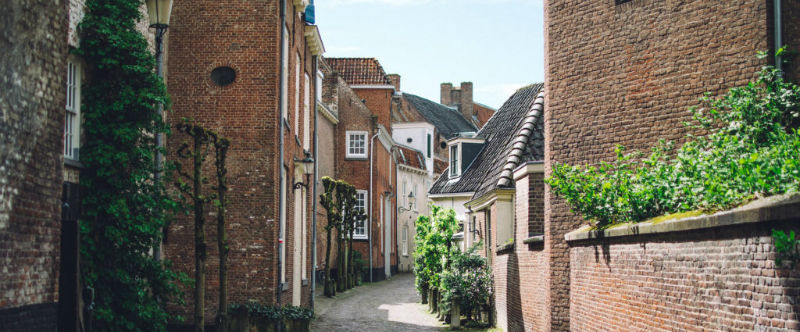 street view of brown houses