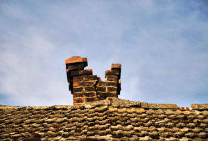 crumbling masonry chimney
