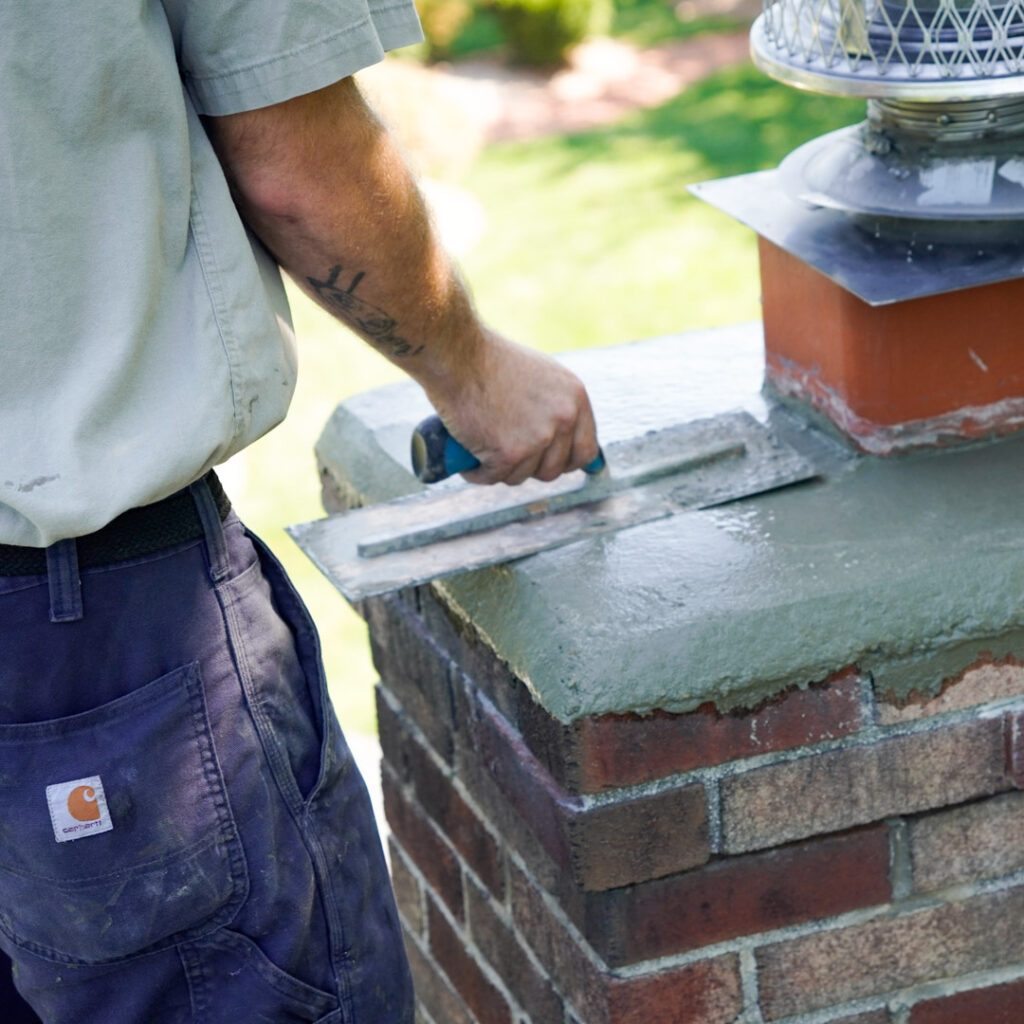 Chimney crown being repaired in Norristown, PA.